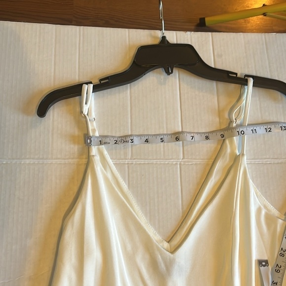 NWT-Bebe-XL-white-stretchy, adjustable straps, wrap skirt romper. Built in short - Picture 9 of 13